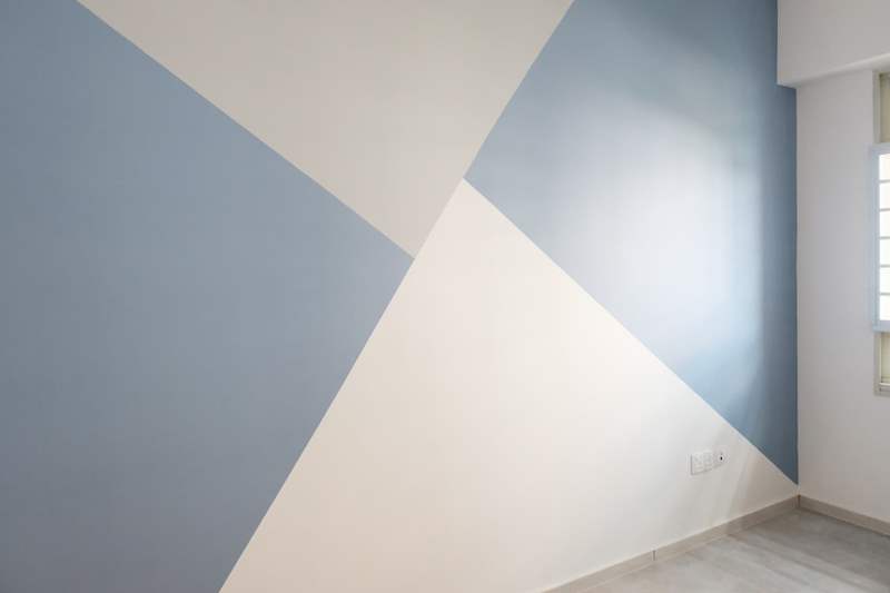 Feature wall painted in geometric blocks of blue, grey and white - HDB flat renovation with a navy kitchen and a glass-walled walk-in wardrobe (407B) | Larry Contractors, HDB Licensed Renovation Contractor, Singapore