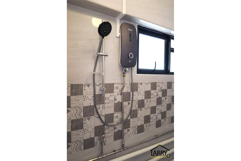 Shower corner with an instant water heater, hand shower and a patterned tile band under the window - HDB resale flat renovation with polished terrazzo floors, new kitchen and bathrooms (C04) | Larry Contractors, HDB Licensed Renovation Contractor, Singapore