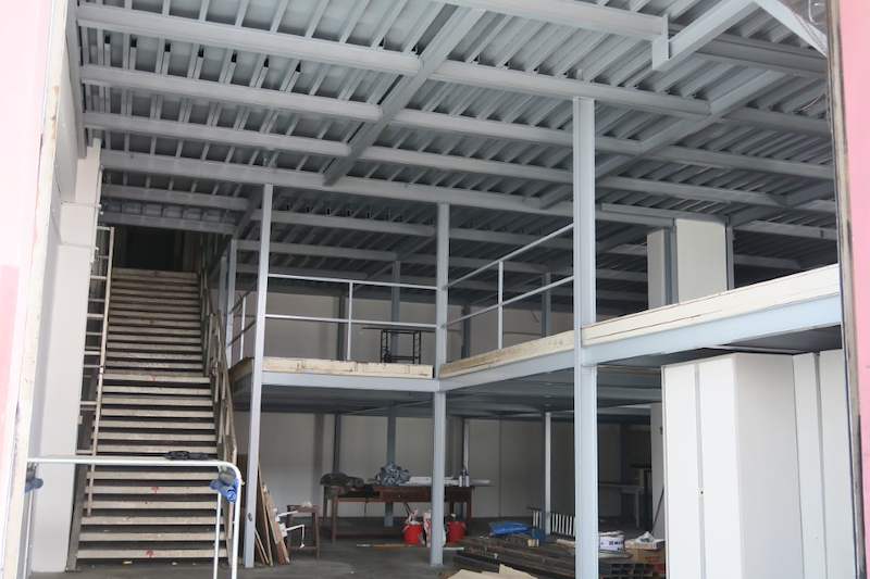 Two-level steel mezzanine with metal decking, railings and a staircase inside an industrial unit - Two-level steel mezzanine with staircases in an industrial unit (HF0107) | Larry Contractors, HDB Licensed Renovation Contractor, Singapore