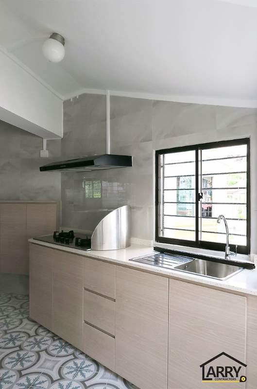 Kitchen with a gas hob, stainless sink, cooker hood and a grilled window - HDB resale flat renovation with polished terrazzo floors, new kitchen and bathrooms (C04) | Larry Contractors, HDB Licensed Renovation Contractor, Singapore