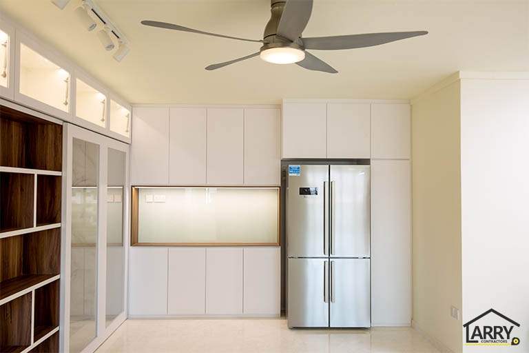 Kitchen entrance with a backlit display niche, white upper cabinets and a stainless steel fridge - HDB flat renovation with full-height carpentry and a wood-tone kitchen (C12) | Larry Contractors, HDB Licensed Renovation Contractor, Singapore