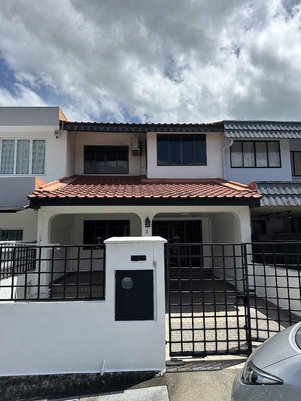 Before: the original terrace house with a red tiled roof, metal railings and an old rendered facade - Terrace house renovation with new facade and full interior (3TBA) | Larry Contractors, HDB Licensed Renovation Contractor, Singapore