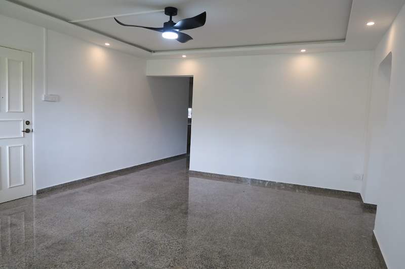 Living room looking towards the hallway with white doors and terrazzo floor - HDB resale flat renovation with polished terrazzo floors, new kitchen and bathrooms (C04) | Larry Contractors, HDB Licensed Renovation Contractor, Singapore