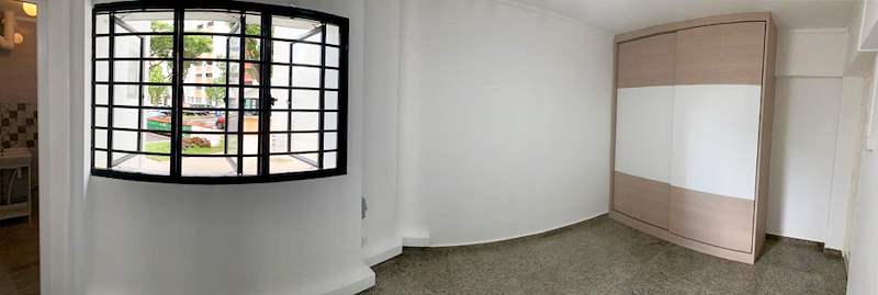 Panoramic view of a bedroom after renovation with a grilled window and sliding-door wardrobe - HDB resale flat renovation with polished terrazzo floors, new kitchen and bathrooms (C04) | Larry Contractors, HDB Licensed Renovation Contractor, Singapore