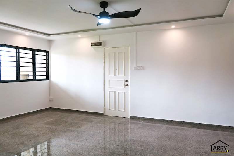 Living room with a grilled window, white entrance door and polished terrazzo floor - HDB resale flat renovation with polished terrazzo floors, new kitchen and bathrooms (C04) | Larry Contractors, HDB Licensed Renovation Contractor, Singapore
