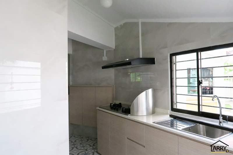 Kitchen run with hob, sink, cooker hood and light wood cabinets under a window - HDB resale flat renovation with polished terrazzo floors, new kitchen and bathrooms (C04) | Larry Contractors, HDB Licensed Renovation Contractor, Singapore