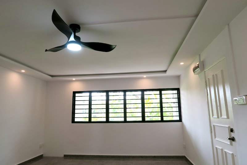 Living room ceiling fan light and cove lighting above the grilled window and door - HDB resale flat renovation with polished terrazzo floors, new kitchen and bathrooms (C04) | Larry Contractors, HDB Licensed Renovation Contractor, Singapore