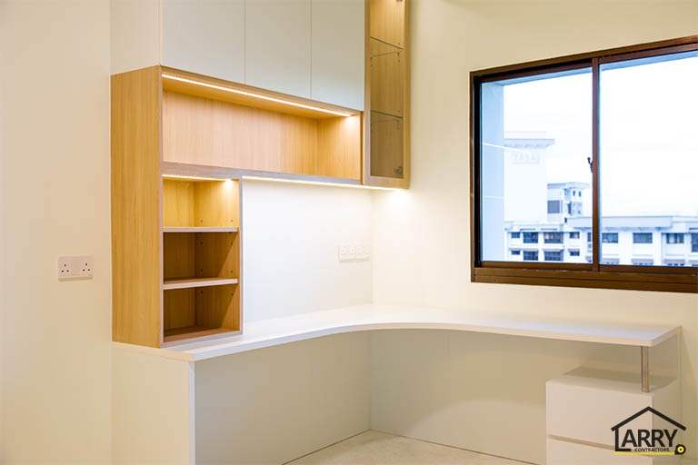 Built-in corner study desk with drawers, overhead cabinets and lit open shelves - HDB flat renovation with full-height carpentry and a wood-tone kitchen (C12) | Larry Contractors, HDB Licensed Renovation Contractor, Singapore