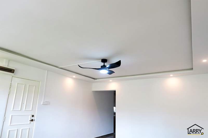Cove ceiling with recessed lights and a black fan light above the white doors - HDB resale flat renovation with polished terrazzo floors, new kitchen and bathrooms (C04) | Larry Contractors, HDB Licensed Renovation Contractor, Singapore