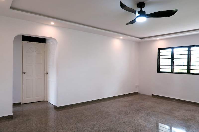 Living room with an arched doorway, white panelled door and polished terrazzo floor - HDB resale flat renovation with polished terrazzo floors, new kitchen and bathrooms (C04) | Larry Contractors, HDB Licensed Renovation Contractor, Singapore