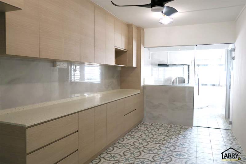 Kitchen with light wood cabinets, marble-look wall tiles, patterned floor tiles and a glass door to the yard - HDB resale flat renovation with polished terrazzo floors, new kitchen and bathrooms (C04) | Larry Contractors, HDB Licensed Renovation Contractor, Singapore