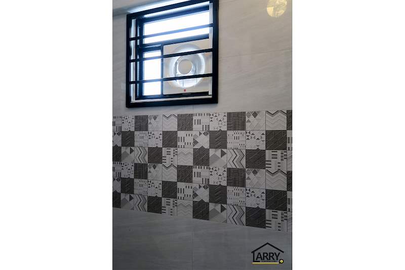 Bathroom window with black grilles above a patterned tile band - HDB resale flat renovation with polished terrazzo floors, new kitchen and bathrooms (C04) | Larry Contractors, HDB Licensed Renovation Contractor, Singapore
